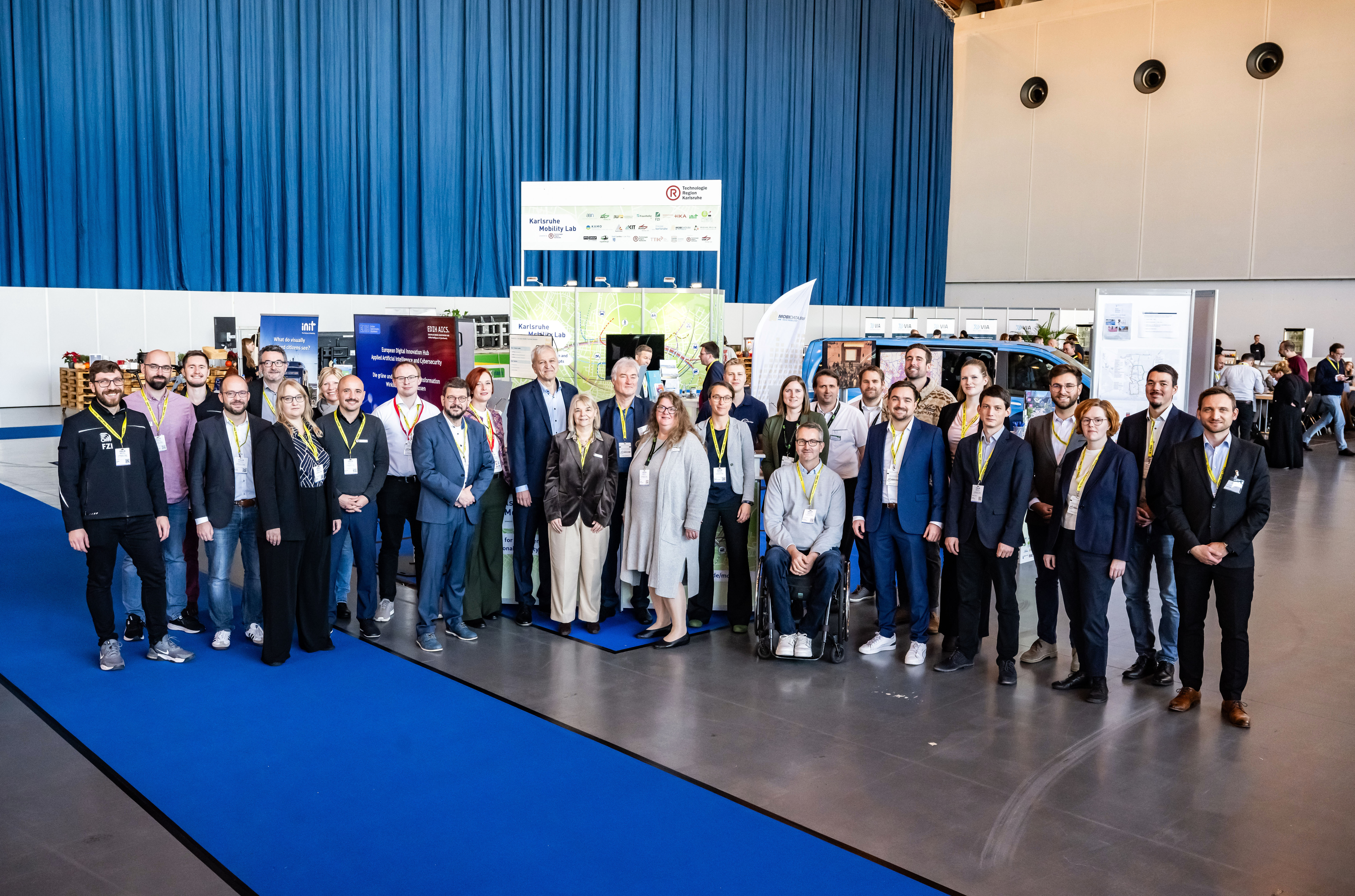 Group photo of the KML/TRK collective stand