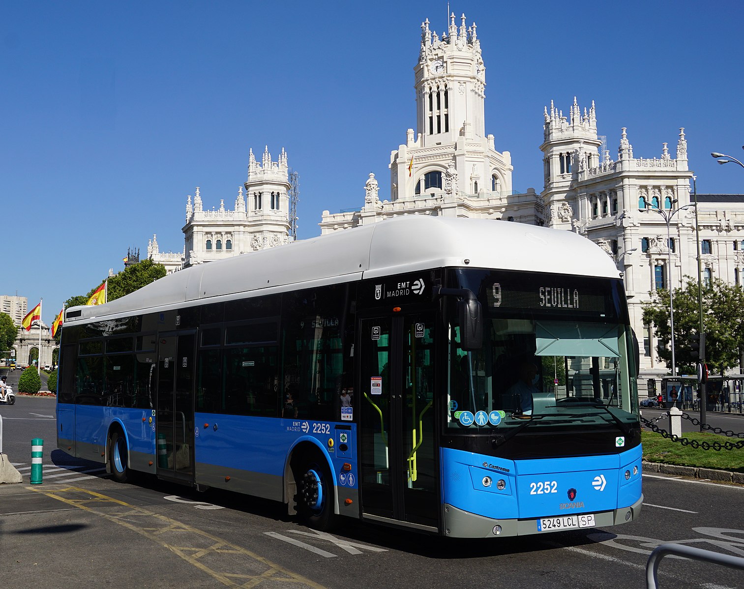 Photo of a blue bus on the street