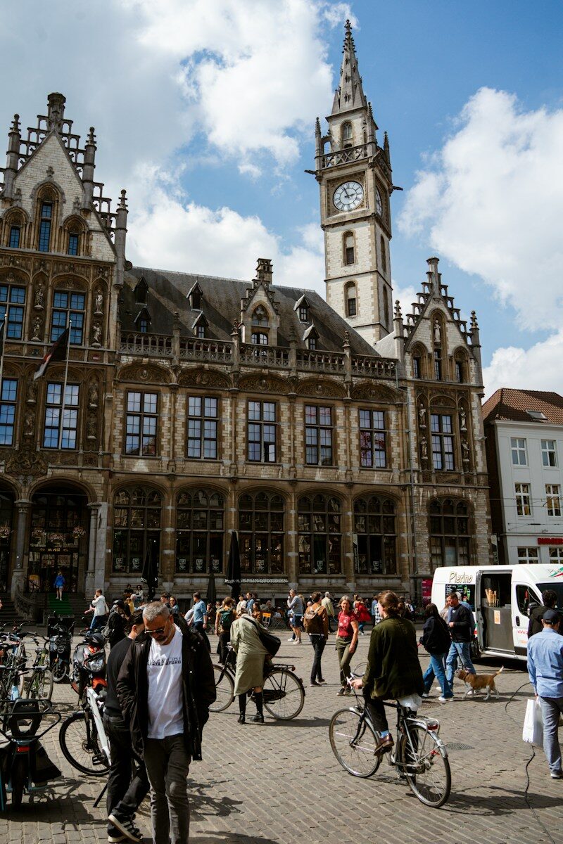 Historic european building with people and bicycles